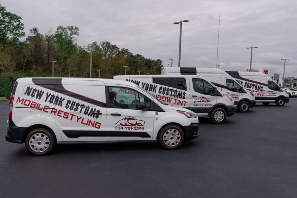 Window tinting installation at New York Customz shop in Dothan Alabama