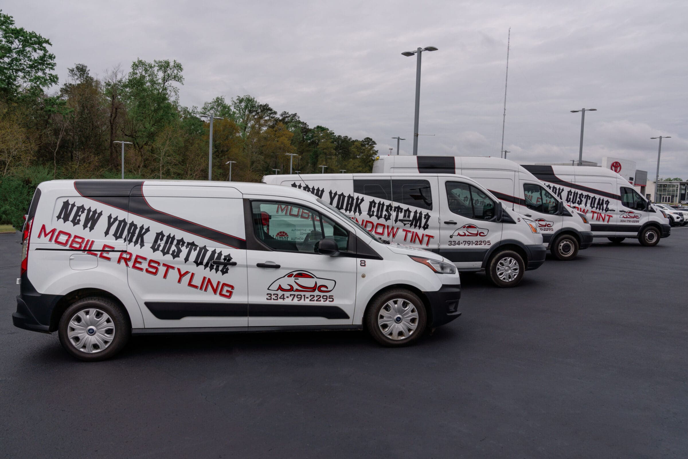 Window tinting installation at New York Customz shop in Dothan Alabama